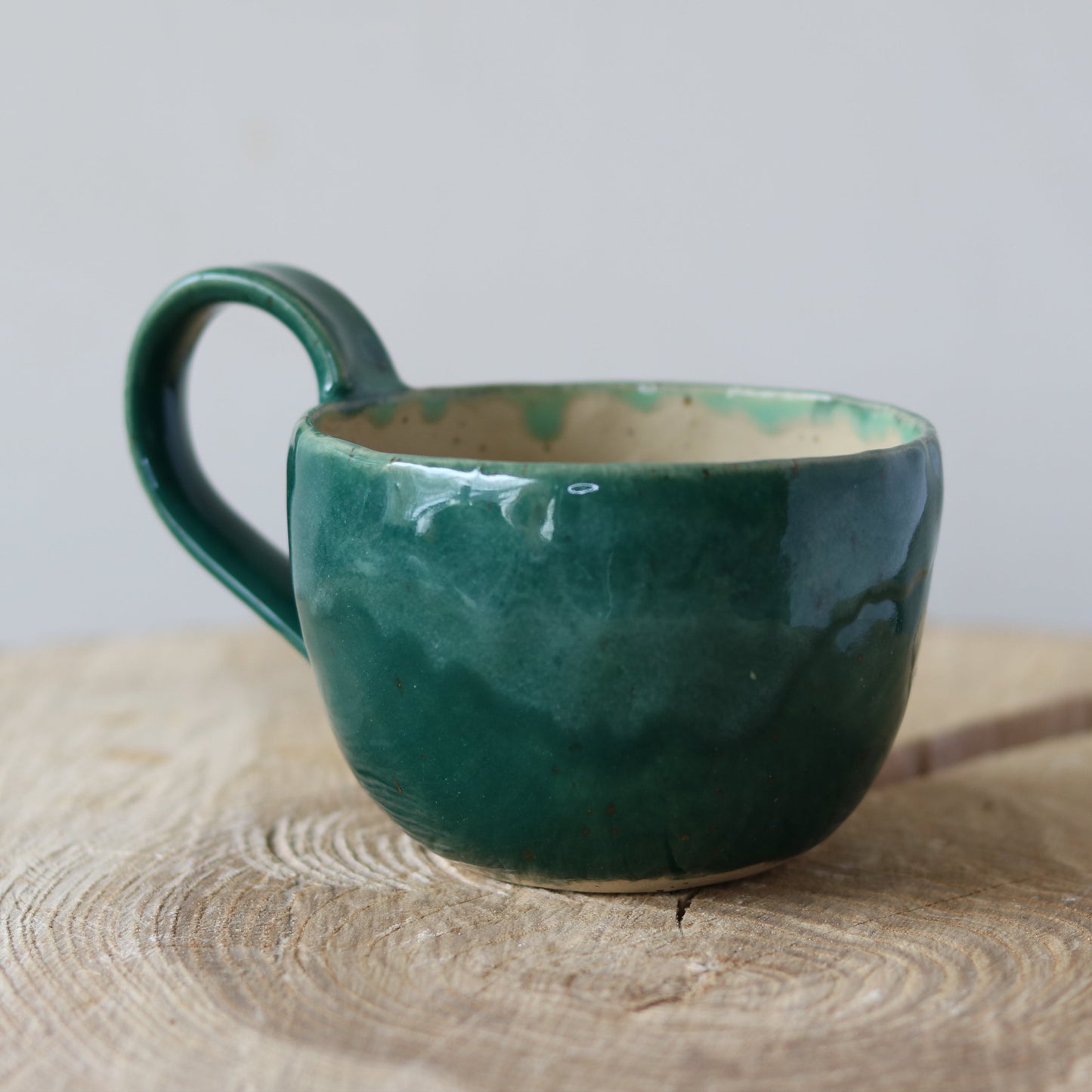 Grøn kop med hank, og teksten Ready.