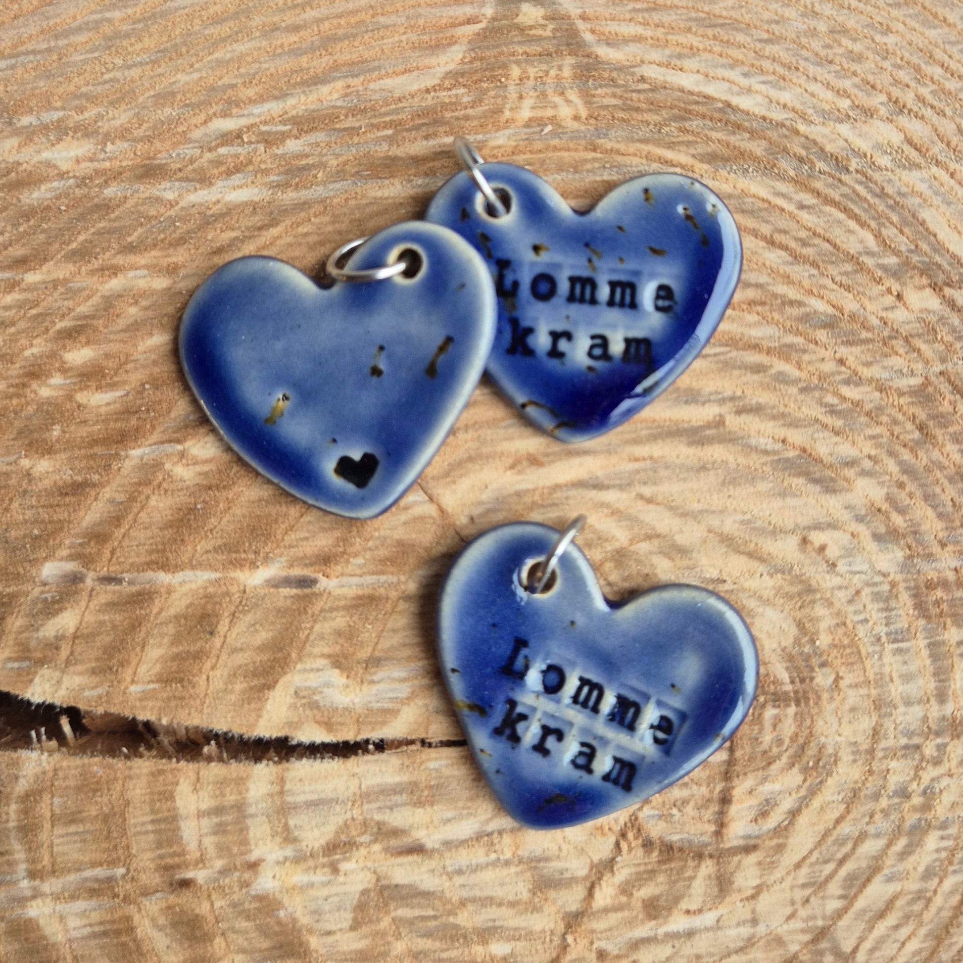 Lomme kram, Mørkeblå med lille rign i metal