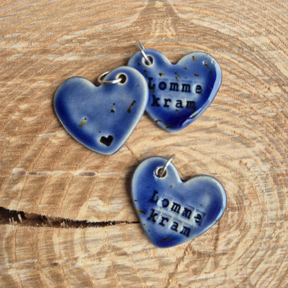 Lomme kram, Mørkeblå med lille rign i metal